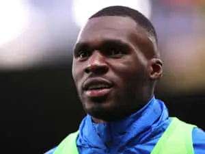 Christian Benteke Wearing Blue Raincoat