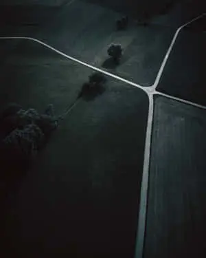 Dark Crossroad at Night