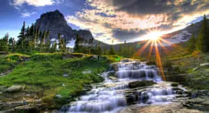 a waterfall in the mountains