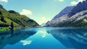 Breathtaking view of an alpine lake in a distant mountain landscape 