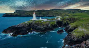 Lighthouse In Cliff Ireland Desktop