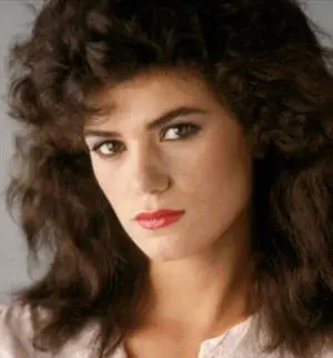 Linda Fiorentino striking a pose with her iconic hairstyle.