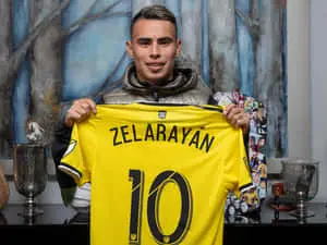 Lucas Zelarayan Holding His Columbus Crew Jersey