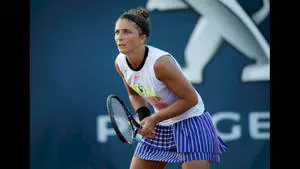 Sara Errani in Deep Concentration on the Tennis Court