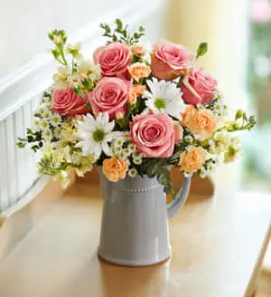 Watering Can Filled With Flowers Picture